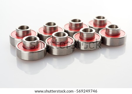 Long board Skateboard Bearings with built-in spacers on a white background.  ?lipping path.