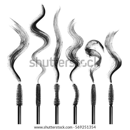 Set of various mascara brushes with mascara strokes isolated on white background  Royalty-Free Stock Photo #569251354