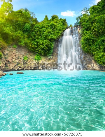 Beautiful "Dambri" waterfall in tropical forest. Vietnam