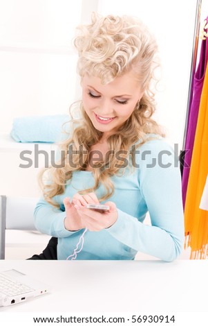 picture of lovely woman with calculator and computer