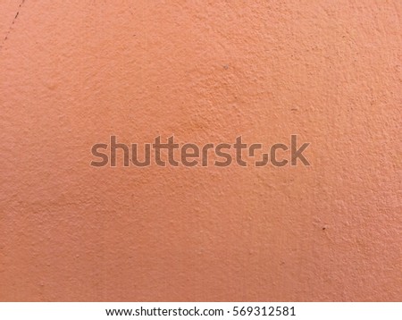 Orange paint concrete wall background and texture