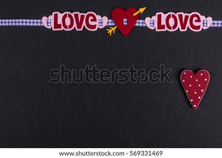 heart and word love on the black background