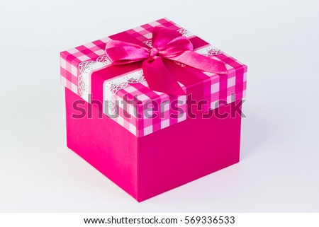 beautiful gift box with a bow on a white background.