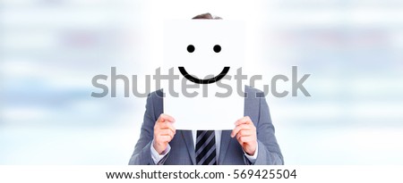 Hands with smiling card