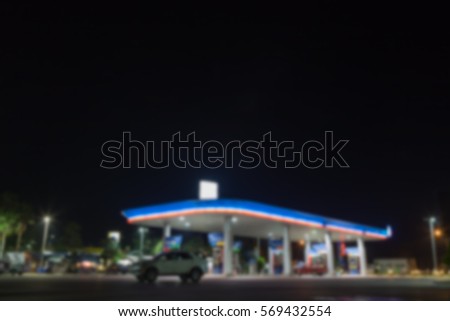 Blurry night photo of petrol station in Thailand