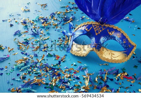 Image of blue with gold elegant venetian mask.