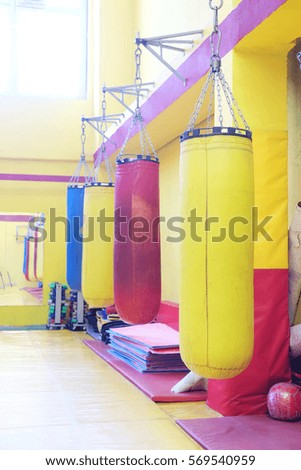 Fitness hall with punching bags  