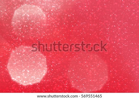 Red  Abstract Festive Background with circles, glitter or bokeh lights. Round defocused particles. Valentines day template.