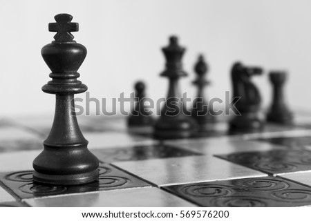 Chess photographed on a chessboard Royalty-Free Stock Photo #569576200