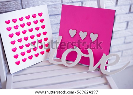 Wooden handmade pictures and wooden word love