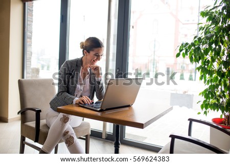 Businesswoman is working on computer