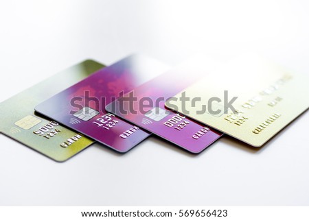 pile of credit cards on white background