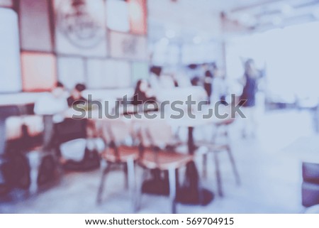 Blurred  background abstract and can be illustration to article of Tables and chairs in restaurant