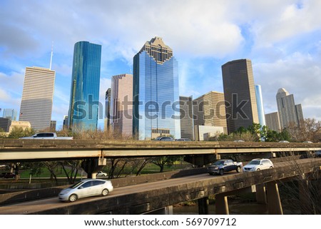 Skyline of Houston in blue sky with sun light