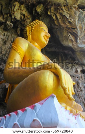 golden buddha statue at erawan cave(Wat tham erawan temple) Nongbualumphu province, thailand.
