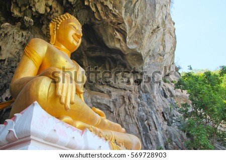 golden buddha statue at erawan cave(Wat tham erawan temple) Nongbualumphu province, thailand.
 Royalty-Free Stock Photo #569728903