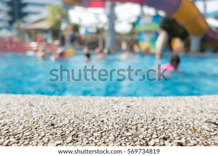 Swimming pool side rock surface for backdrop