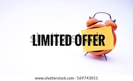 LIMITED OFFER text on a clock with a white background. Business Concept.