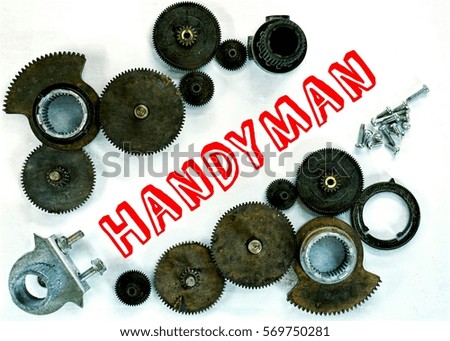mechanism concept. gear mechanism which is arranged on a white background and the written word (handyman) in the middle