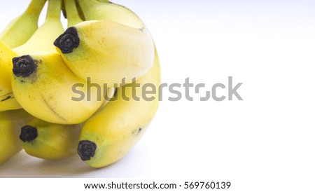 Closeup of bananas isolated on white background. Selective focus.
