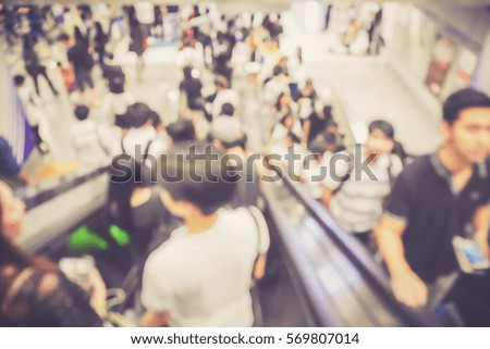 Picture blurred  for background abstract and can be illustration to article of People using the escalator