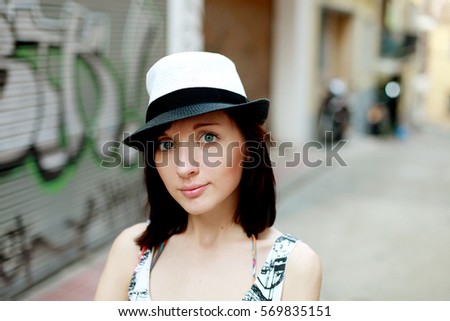Girl in a straw hat. Summer and relax