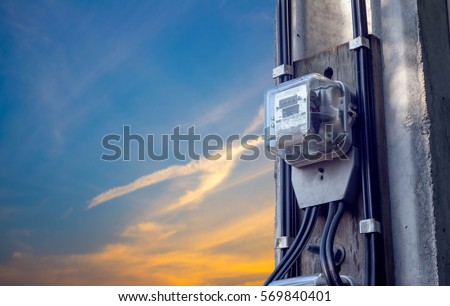 electric meters Separated from the sky background Royalty-Free Stock Photo #569840401