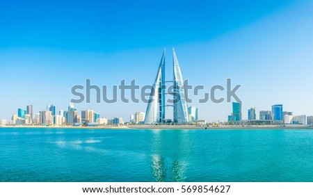 Skyline of Manama dominated by the World trade Center building, Bahrain. Royalty-Free Stock Photo #569854627