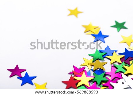 scattered color little star shape ornament with copy space. portrait size high color saturation confetti with perspective view.