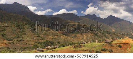 A village with rondavels, traditional houses, in the mountains of Lesotho.