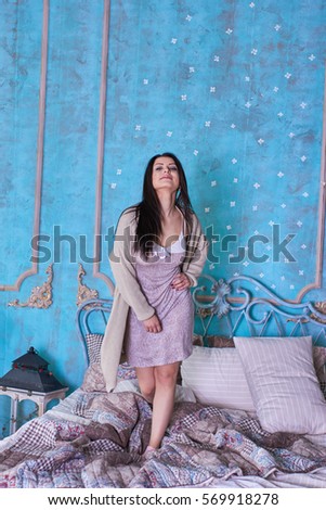 Young Woman  Dancing on Bed 