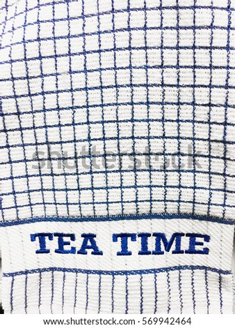 A blue and white tea towel