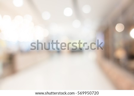 Abstract blur and bokeh shopping mall and retails store interior for background
