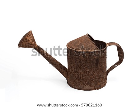 Old rusty metal watering can isolated white background