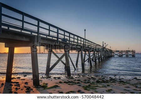 Fishing pier in Southport, North Carolina/ Southport Pier Royalty-Free Stock Photo #570048442