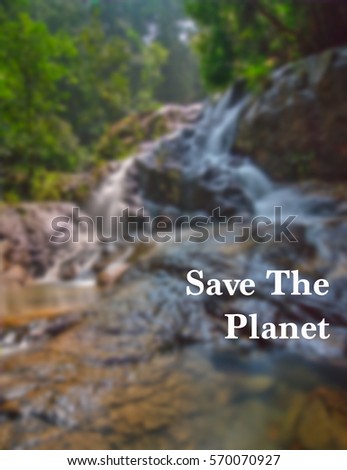 Word SAVE THE PLANET written on waterfall Motion Blur Background