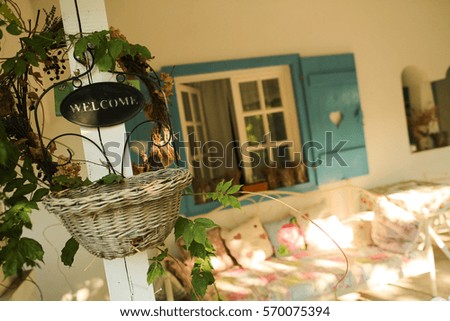 Welcome sign at beautiful house