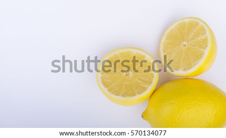 Closeup of lemon on a white background. Selective focus