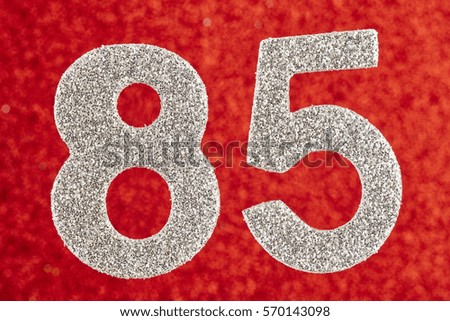 Number eighty-five silver color over a red background. Anniversary. Horizontal