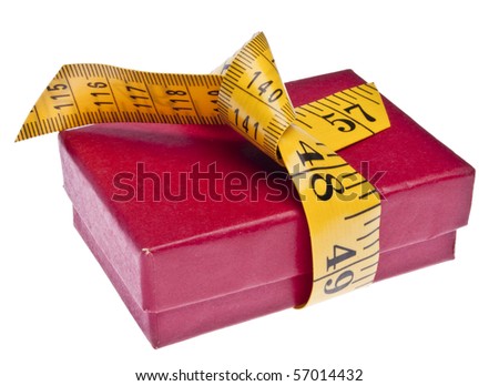 Festive Red Holiday box Wrapped in a Measuring Tape.  Holiday Budget Concept.