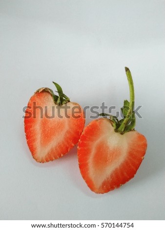 Strawberry's half on a white background.