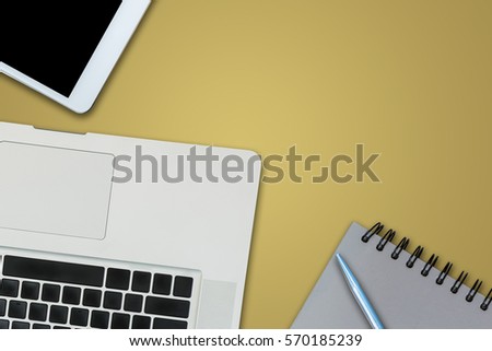 office equipment,laptop computer, smartphone with white screen over a notebook and cup of coffee. Top view on yellow background with copy space, flat lay.