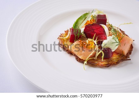 Beautiful and tasty food on a plate Royalty-Free Stock Photo #570203977