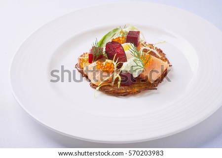 Beautiful and tasty food on a plate Royalty-Free Stock Photo #570203983