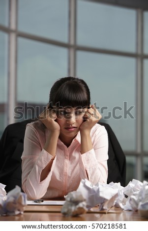 Indian woman stressed at work