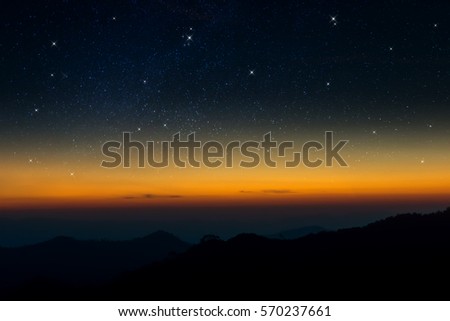 Silhouettes Mountain and Sky before sunrise with star.