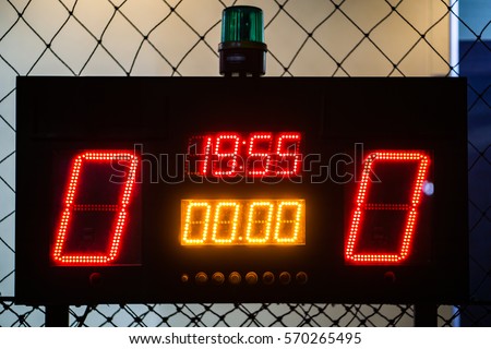 LED Score Board Panel in the Indoor Soccer Field at the Night Time Royalty-Free Stock Photo #570265495