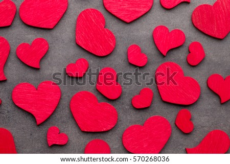 Red heart on the gray background.