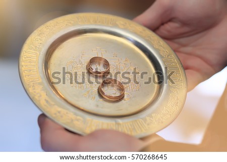 the golden rings on a gold plate