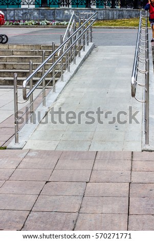 Equipped with outdoor access for the disabled. The stainless steel railings.